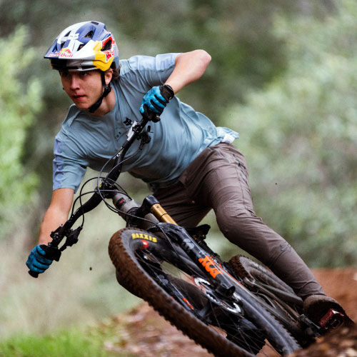 Jackson Goldstone riding a mountain bike.