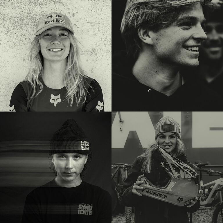 Four athletes in black and white.